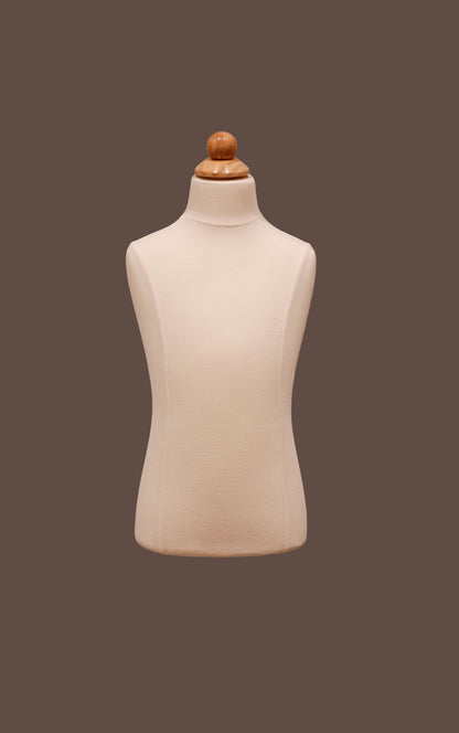 Beige mannequin torso with wooden head on a dark brown background