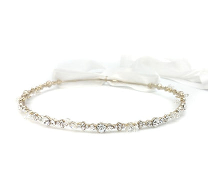 Silver headband with crystals on a white background