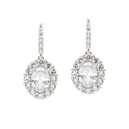Pair of silver earrings with clear gemstones on a white background