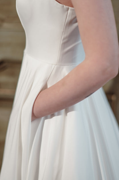 White dress with a plain background