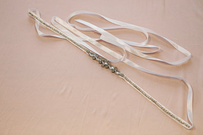 Decorative ribbon with decorative elements on a beige background