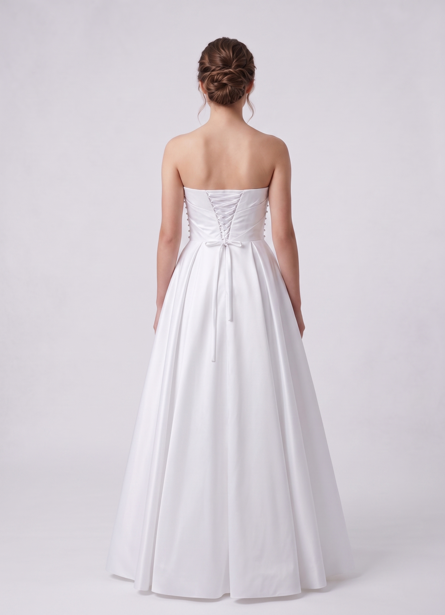 White strapless gown on a white background