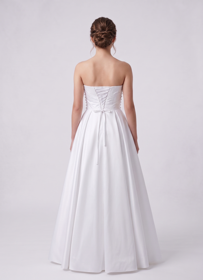 White strapless gown on a white background