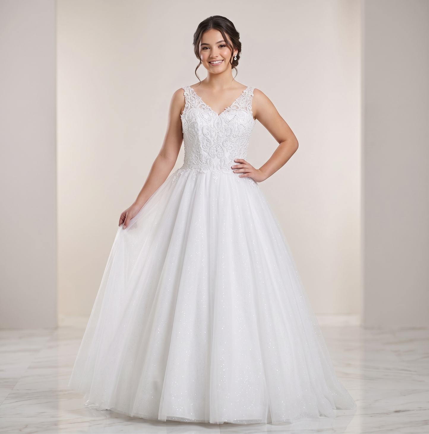 Woman wearing a white wedding dress with lace bodice and flowing skirt against a plain background