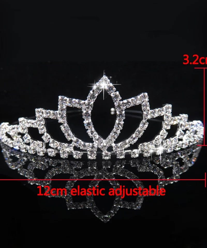 Silver tiara with crystal embellishments on a black background