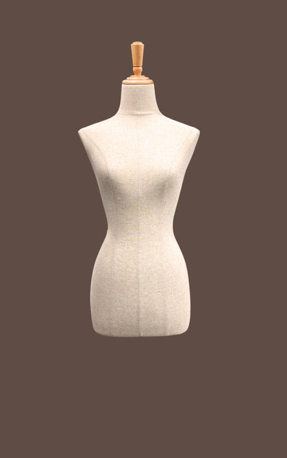Beige dress form on a dark brown background