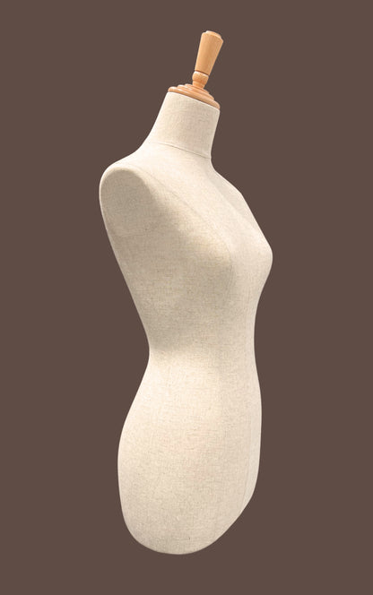 Mannequin torso on a brown background