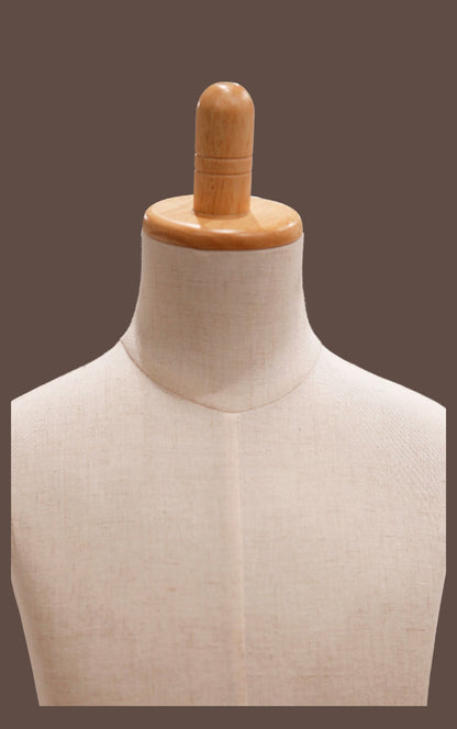 Mannequin torso with wooden head and neck on a plain background
