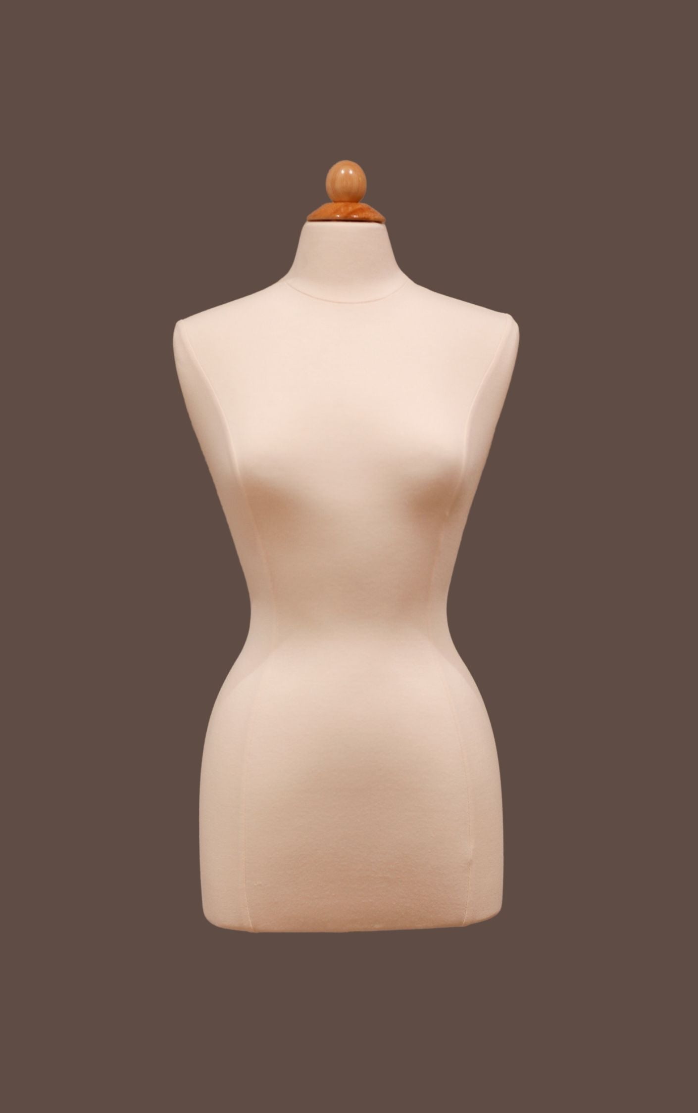 Mannequin torso on a brown background
