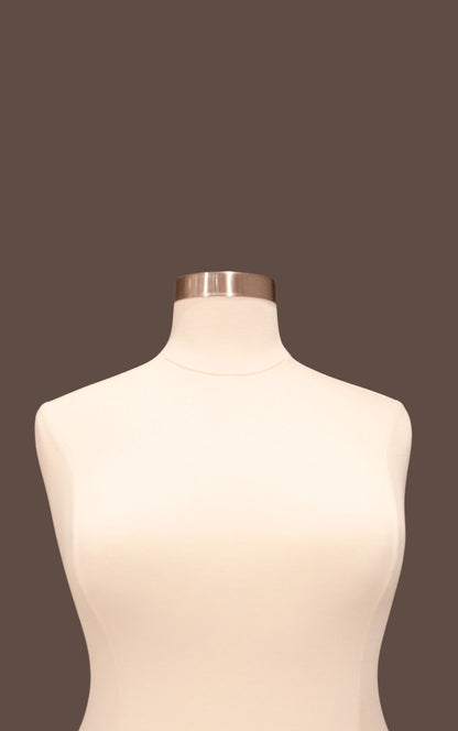Mannequin torso on a brown background