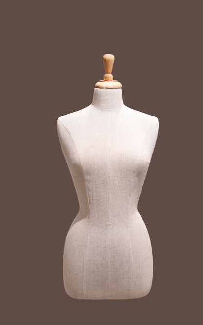Mannequin torso on a brown background