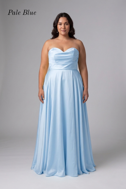 A woman modeling a strapless pale blue floor-length gown against a light gray studio background. The text 'Pale Blue' appears in the upper left corner.