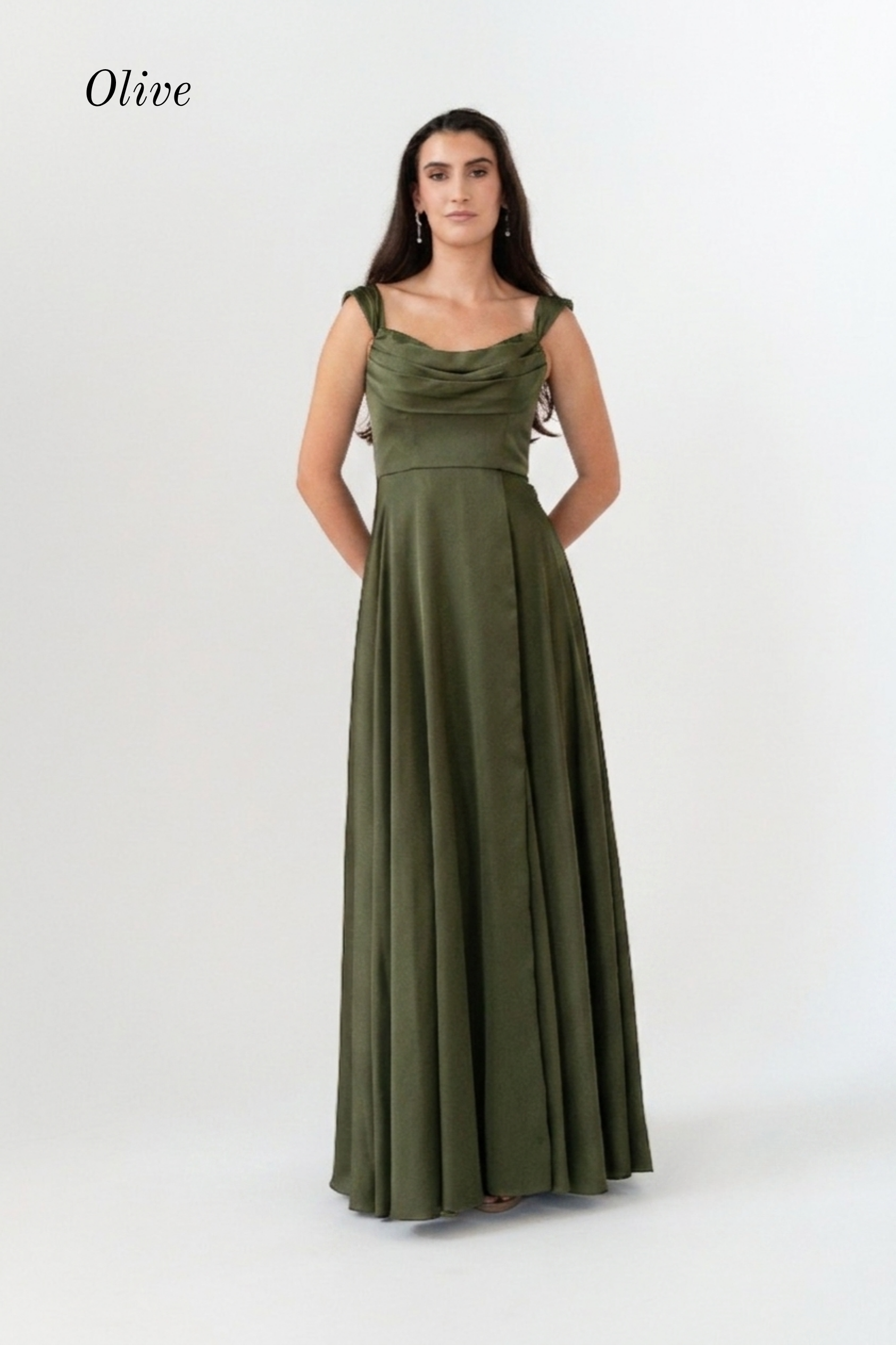 A woman modeling an olive green sleeveless maxi dress with a draped neckline and a fitted waist, standing against a plain light gray studio background. The word 'Olive' appears in the upper left corner.