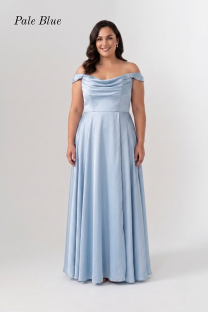 A woman modeling a pale blue off-the-shoulder maxi dress against a light gray studio background, with the text 'Pale Blue' in the top left corner.