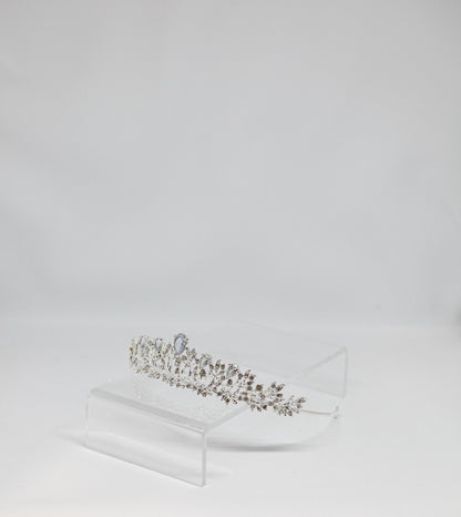 Jeweled tiara on a white box with a white background