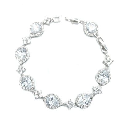 Silver bracelet with clear gemstones on a white background