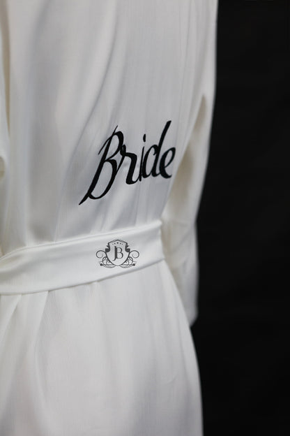 White garment with 'Bride' text on a black background